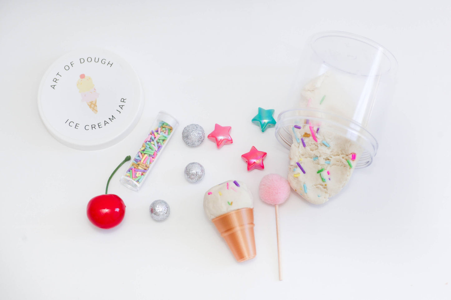 Ice Cream Sensory Jar: Homemade sensory dough (vanilla with clay sprinkles)