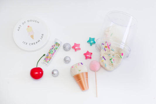 Ice Cream Sensory Jar: Homemade sensory dough (vanilla with clay sprinkles)